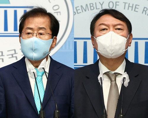 홍준표(왼쪽) 의원과 윤석열 국민의힘 대선 후보. 연합뉴스